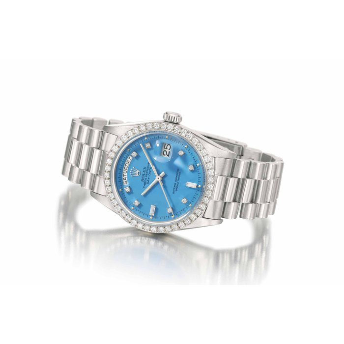 Rolex. A rare and attractive platinum and diamond automatic calendar wristwatch with sweep centre seconds, bracelet and turquoise lacquer dial SIGNED ROLEX, OYSTER PERPETUAL, DAY-DATE, REF. 1804, CASE NO. 1'062'746, CIRCA 1964