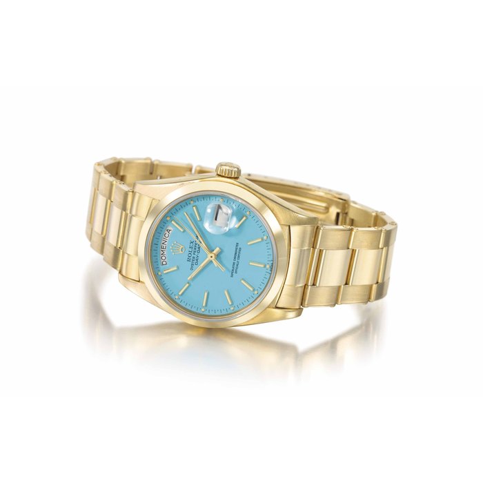 Rolex. A fine, attractive and rare 18k yellow gold automatic wristwatch with sweep centre seconds, day, date, bracelet and turquoise lacquered dial SIGNED ROLEX, OYSTER PERPETUAL, DAY-DATE MODEL, REF. 18028, CASE NO. 6'127'318 MANUFACTURED IN 1981