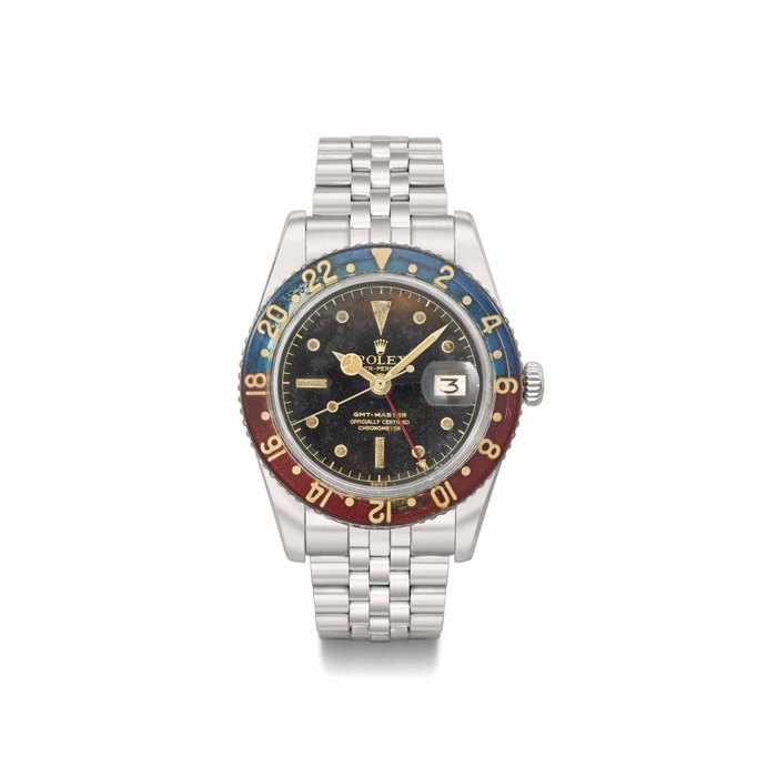 Rolex. A very rare and attractive stainless steel automatic dual time wristwatch with sweep centre seconds, date, bracelet, 'tropical' dial and bakelite bezel SIGNED ROLEX, OYSTER PERPETUAL, GMT-MASTER, REF. 6542, CASE NO. 355'786, MANUFACTURED IN 1957