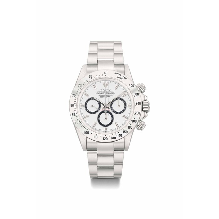 Rolex. A rare and attractive stainless steel automatic chronograph wristwatch with white dial, bracelet, guarantee and box SIGNED ROLEX, OYSTER PERPETUAL, COSMOGRAPH, DAYTONA, REF. 16520, CASE NO. A880'118, CIRCA 1999