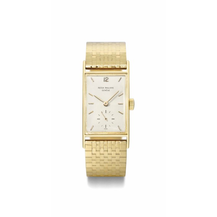 Patek Philippe. A fine 18K gold rectangular curved wristwatch SIGNED PATEK PHILIPPE, GENÈVE, REF. 2554/1, MOVEMENT NO. 975'884, CASE NO. 691'837, MANUFACTURED IN 1953