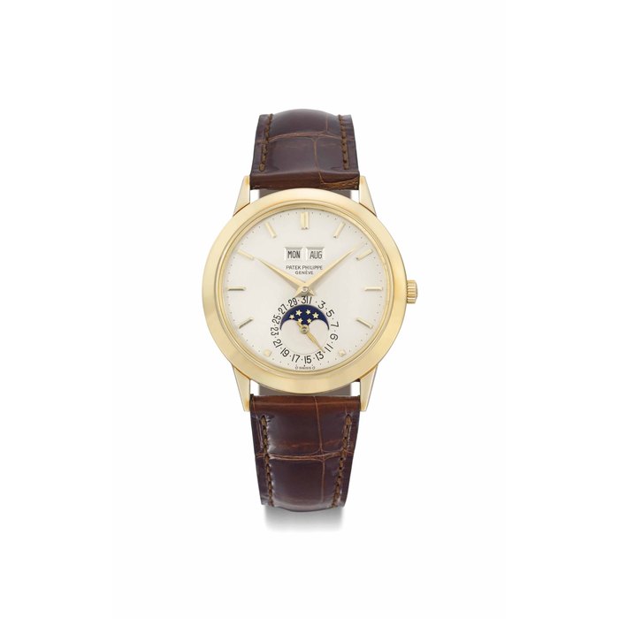 Patek Philippe. A very fine, extremely rare and historically important 18K gold automatic perpetual calendar wristwatch with moon phases SIGNED PATEK PHILIPPE, GENÈVE, REF. 3450, MOVEMENT NO. 1'119'586, CASE NO. 2'788'611, MANUFACTURED IN 1981
