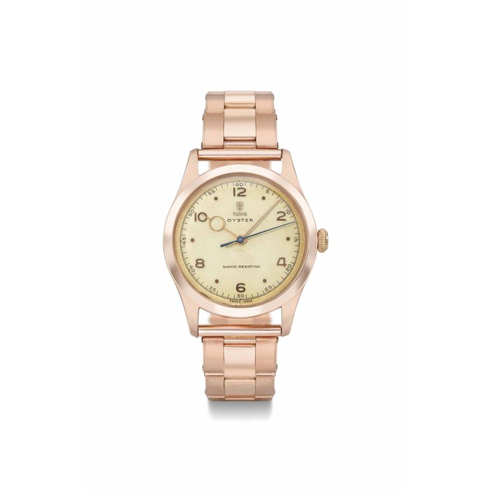 Tudor. A very rare and attractive 14K pink gold tonneau-shaped wristwatch with bracelet SIGNED TUDOR, OYSTER, SHOCK-RESISTING, REF. 4463, CASE NO. 42'861, CIRCA 1959