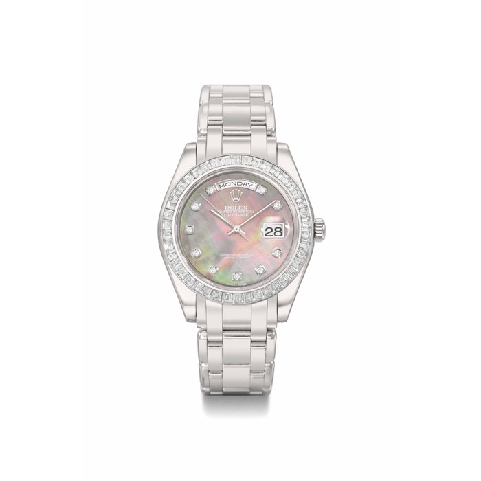 Rolex. An extremely fine and heavy platinum and diamond-set automatic wristwatch with sweep centre seconds, day, date, mother-of-pearl dial and bracelet SIGNED ROLEX, OYSTER PERPETUAL DAY-DATE, REF. 18956, CASE NO. P197979, CIRCA 2000