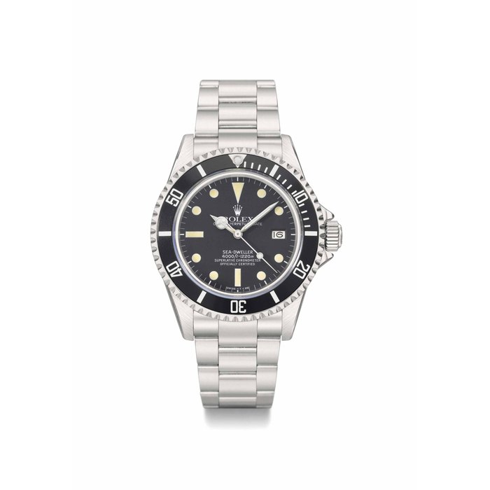 Rolex. A stainless steel automatic water-resistant wristwatch with sweep centre seconds, date, bracelet, certificate and box SIGNED ROLEX, OYSTER PERPETUAL DATE, SEA-DWELLER, 4000FT=1220M, SUPERLATIVE CHRONOMETER OFFICIALLY CERTIFIED, REF. 16660, CASE NO. 6'547'952, CIRCA 1981