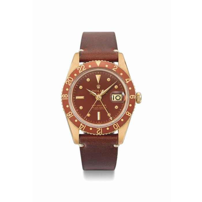 Rolex. A very rare, early 18K gold automatic dual time wristwatch with sweep centre seconds and date SIGNED ROLEX, OYSTER PERPETUAL, GMT-MASTER, REF. 6542, CASE NO. 486'469, CIRCA 1959