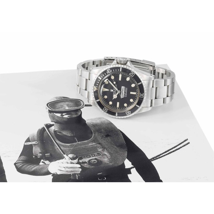 Rolex, made for Comex. A very rare stainless steel automatic wristwatch with sweep centre seconds, gas escape valve, hack feature, maxi dial and bracelet, Cx Pro depth gauge, knife, sheath, wetsuit, mask, flippers, bag, personal log book and various documentation SIGNED ROLEX, OYSTER PERPETUAL, 660FT=200M, SUBMARINER, REF. 5514/5513, CASE NO. 5'230'248, COMEX NO. 763, MANUFACTURED IN 1977