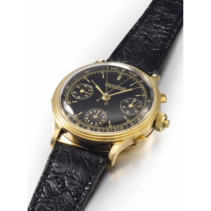 Eberhard. An extremely fine and unusual oversized 18K gold split seconds chronograph wristwatch with black dial SIGNED EBERHARD & CO., LA CHAUX-DE-FONDS, MOVEMENT NO. 15'976, CASE NO. 1'001'457, CIRCA 1940