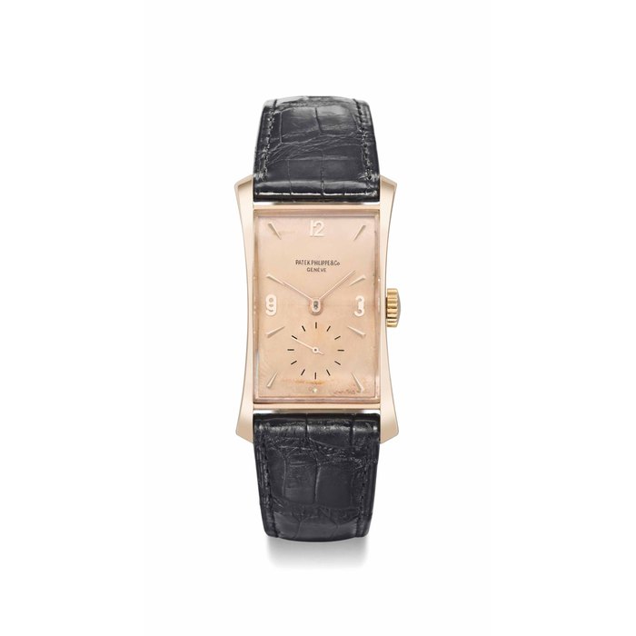 Patek Philippe. A fine, rare and attractive 18K pink gold rectangular-shaped flared wristwatch with pink dial SIGNED PATEK PHILIPPE, GENÈVE, REF. 1593, MOVEMENT NO. 838'294, CASE NO. 641'463, MANUFACTURED IN 1946