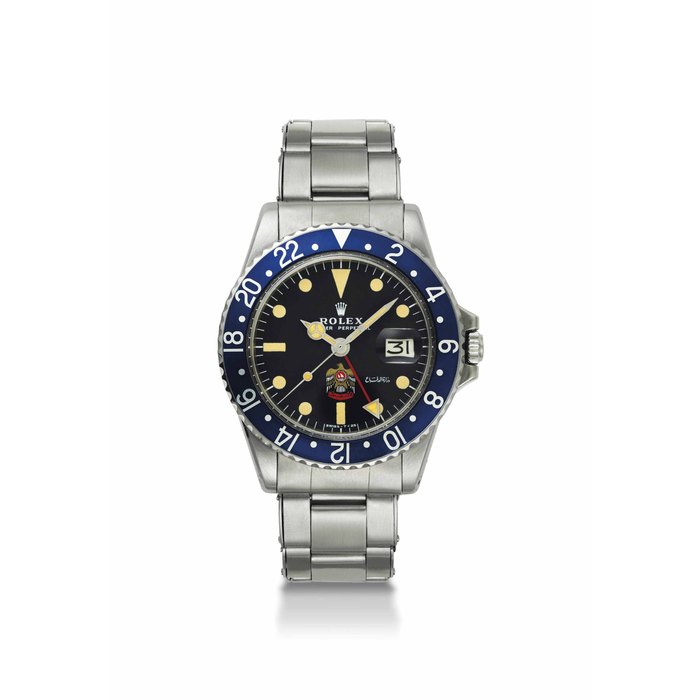 Rolex. A very fine and very rare stainless steel dual time automatic wristwatch with sweep centre seconds, date, bracelet and navy blue bezel, made for His Highness Sheikh Mohammed bin Rashid Al Maktoum SIGNED ROLEX, OYSTER PERPETUAL, GMT-MASTER MODEL, REF. 1675, CASE NO. 2'768'462, CIRCA 1971
