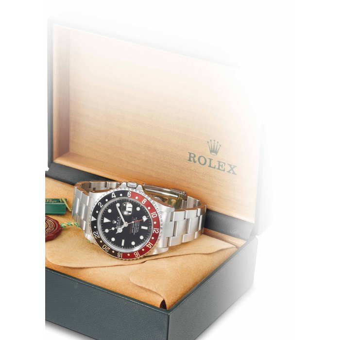 Rolex and The Real McCoy's. A very rare stainless steel automatic dual time wristwatch with sweep centre seconds, date, bracelet, original The Real McCoy's guarantee SIGNED ROLEX, OYSTER PERPETUAL DATE, CHUCK YEAGER, GMT-MASTER II, THE REAL MCCOY'S, REF. 16710, CASE NO. A504636, CIRCA 1998