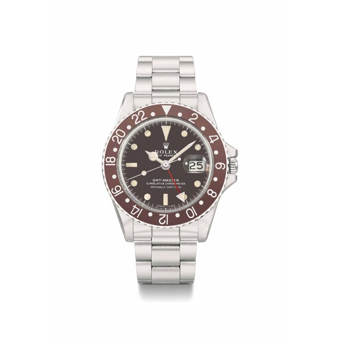 Rolex. A rare stainless steel automatic dual time wristwatch with sweep centre seconds, date, bracelet and "tropical" bezel and dial SIGNED ROLEX, OYSTER PERPETUAL, GMT-MASTER, REF. 1675, CASE NO. 2'011'922, CIRCA 1968
