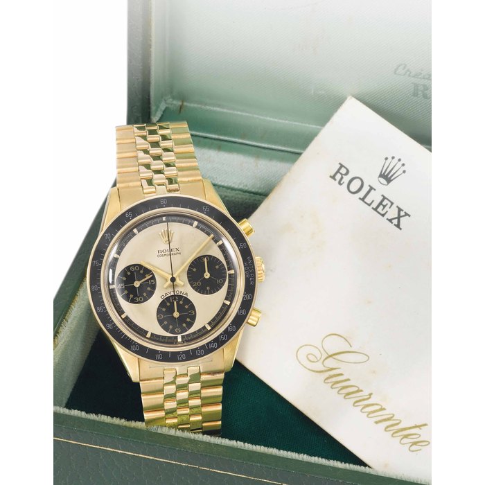 Rolex. An extremely rare and attractive 14K gold chronograph wristwatch with Paul Newman dial and bracelet SIGNED ROLEX, COSMOGRAPH, DAYTONA, PAUL NEWMAN MODEL, REF. 6241, CASE NO. 1'697'097, CIRCA 1968