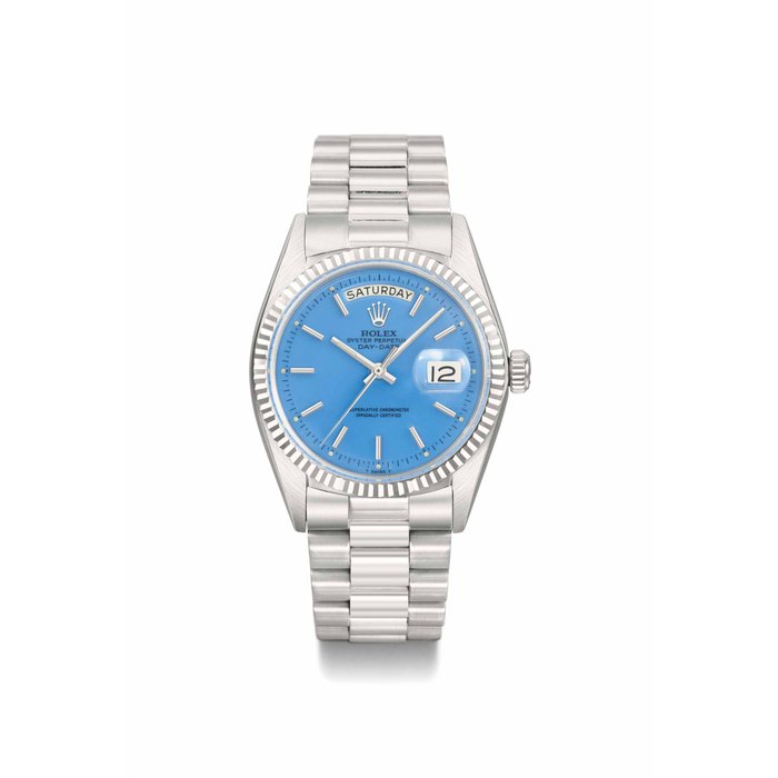 Rolex Rolex. A very fine, rare and attractive 18K white gold automatic calendar wristwatch with sweep centre seconds, turquoise lacquered dial, bracelet and box SIGNED ROLEX, OYSTER PERPETUAL, DAY-DATE, REF. 1803, CASE NO. 2'207'046, CIRCA 1969, Price & Market Data