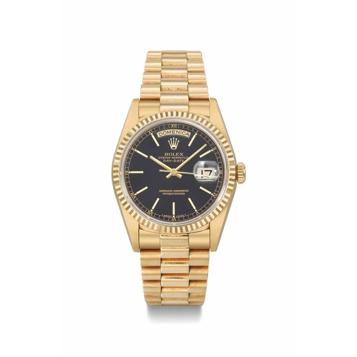 Rolex. A fine and attractive 18K gold automatic wristwatch with sweep centre seconds, day, date, bracelet, and original Guarantee and box SIGNED ROLEX, OYSTER PERPETUAL, DAY-DATE, REF. 18238, CASE NO. E287993, CIRCA 1990