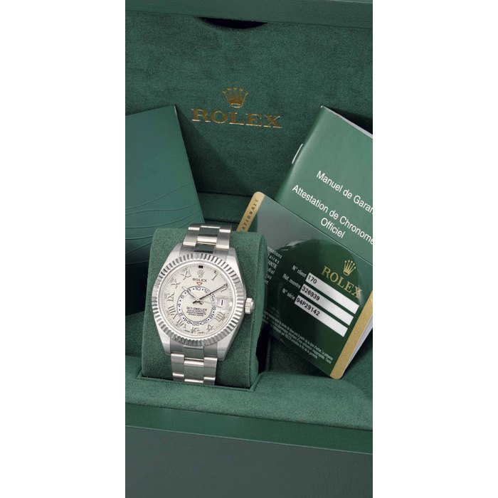 Rolex. A large and attractive 18K white gold automatic wristwatch with date, second time zone indication, annual calendar, guarantee and box SIGNED ROLEX, SKY-DWELLER, REF. 326939, CASE NO. 94P29142, CIRCA 2012