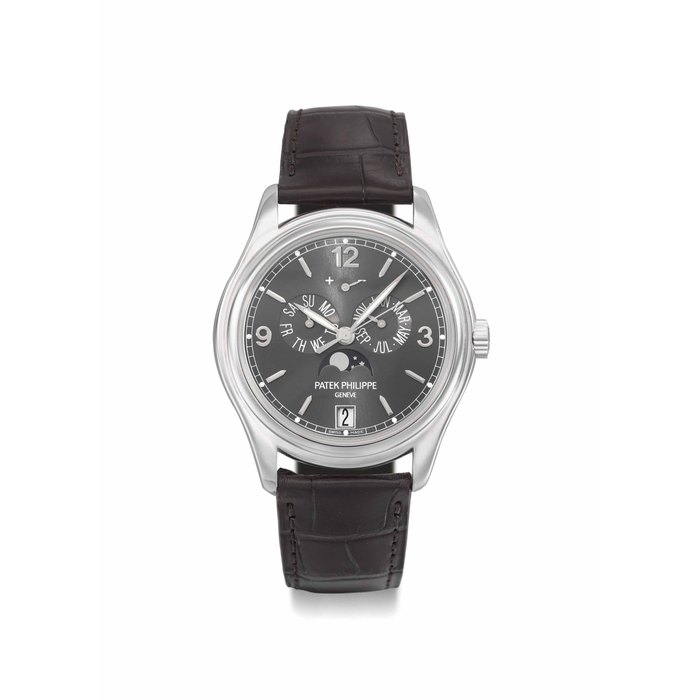 Patek Philippe. A fine 18K white gold annual calendar wristwatch with sweep centre seconds, moon phases and power reserve SIGNED PATEK PHILIPPE, GENEVE, REF. 5146G, MOVEMENT NO. 3'557'226, CASE NO. 4'366'128, MANUFACTURED IN 2006