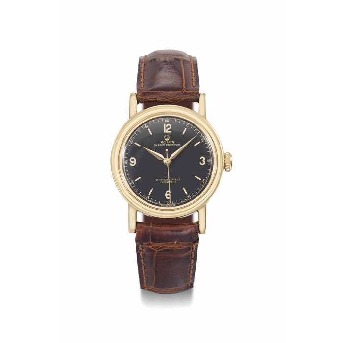 Rolex. A rare and very attractive 18K gold automatic wristwatch with sweep centre seconds and black dial SIGNED ROLEX, OYSTER PERPETUAL, REF. 3548, CASE NO. 46'360, CIRCA 1935