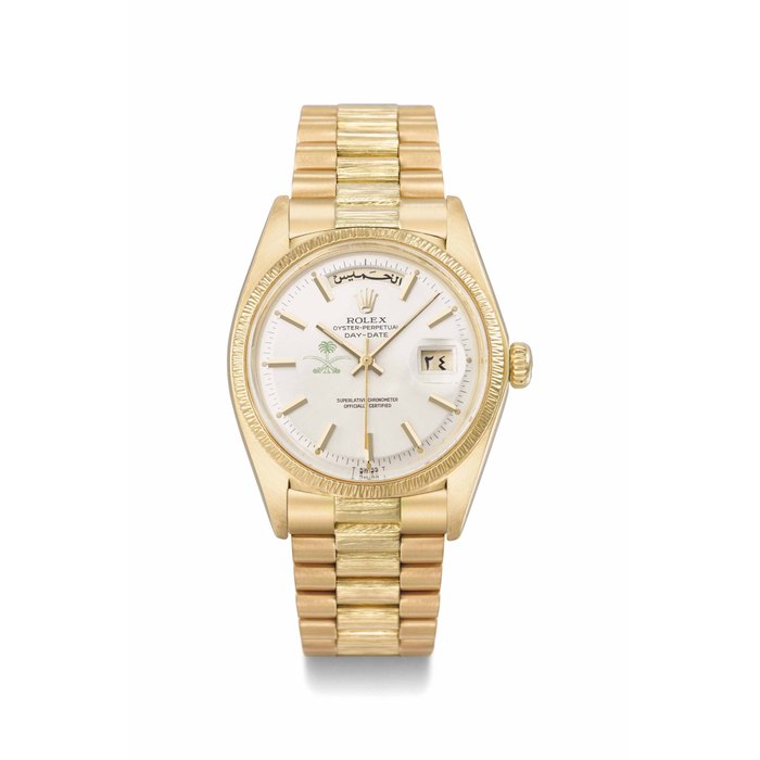 Rolex. A fine and rare 18K gold automatic wristwatch with day and date in Arabic, sweep centre seconds and bracelet, made for the Kingdom of Saudi Arabia. SIGNED ROLEX, OYSTER-PERPETUAL, DAY-DATE, REF. 1807, CASE NO. 3'943'693, CIRCA 1975