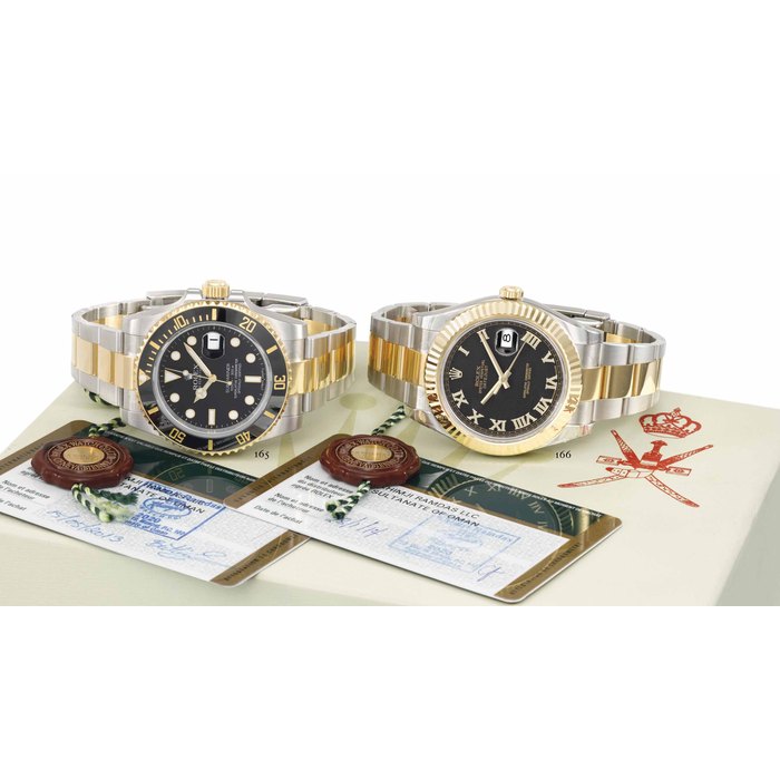 Rolex. A rare and attractive stainless steel and 18K gold automatic wristwatch with date, sweep centre seconds, bracelet, Guarantee, sales tag and box, made for the Sultanate of Oman SIGNED ROLEX, OYSTER PERPETUAL DATE, SUBMARINER, REF. 116613, CASE NO. 8F123322, CIRCA 2013