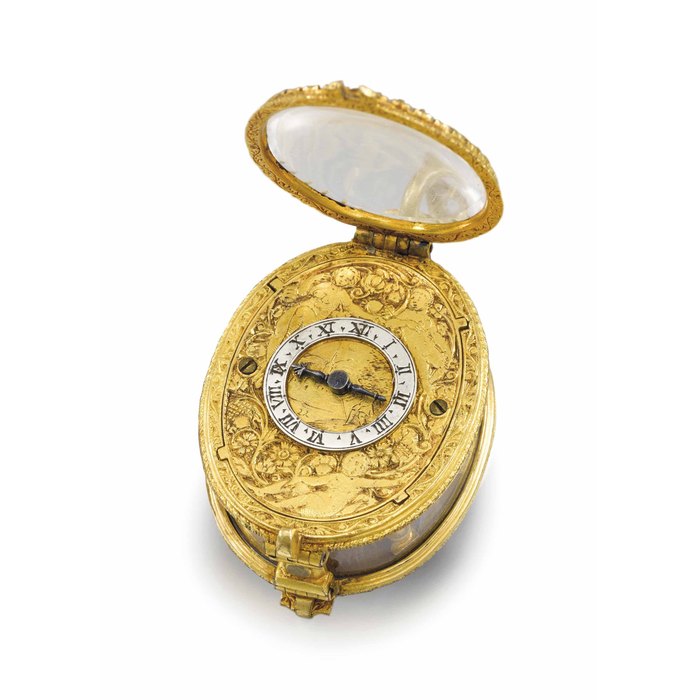 Anon. A rare and early gilt metal and rock crystal oval pre-balance spring single hand pendant watch UNSIGNED, CIRCA 1650