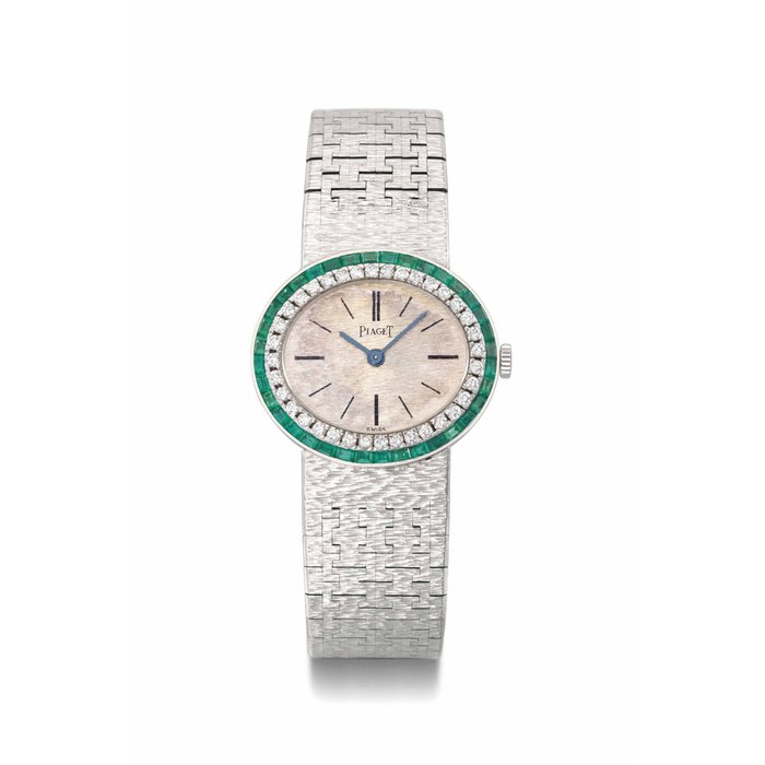 Piaget. A lady's fine and rare 18K white gold, diamond and emerald-set bracelet watch with box SIGNED PIAGET, MOVEMENT NO. 6'905'619, CASE NO. 396, MANUFACTURED IN 1969
