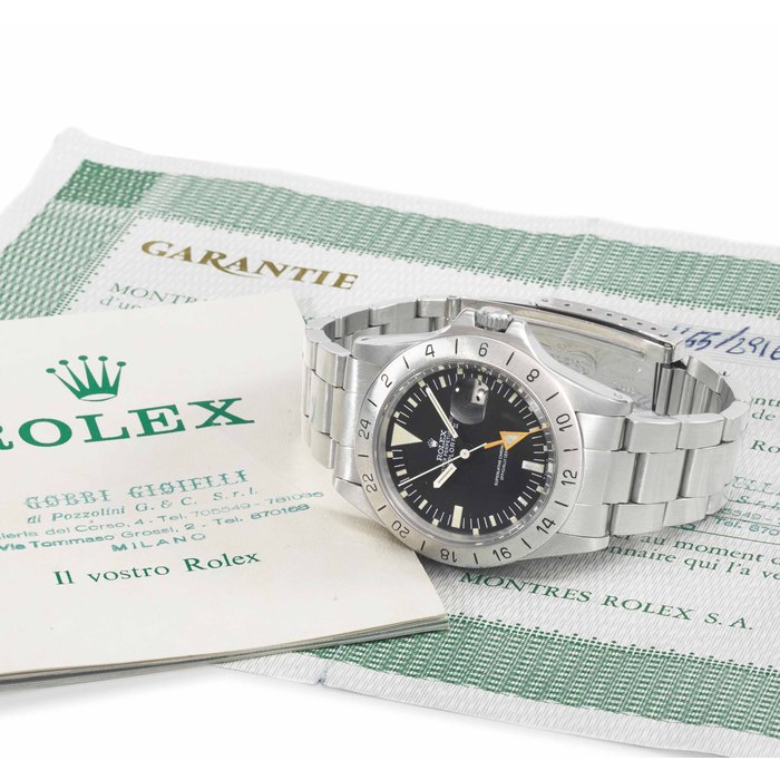 Rolex. A stainless steel automatic wristwatch with sweep centre seconds, 24 hours, date, bracelet, original guarantee and box SIGNED ROLEX, OYSTER PERPETUAL DATE, EXPLORER II, STEVE MCQUEEN MODEL, REF. 1655, CASE NO. 2'916'525, CIRCA 1972
