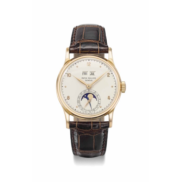 Patek Philippe. A very fine and rare 18K pink gold perpetual calendar wristwatch with phases of the moon SIGNED PATEK PHILIPPE, GENEVE, REF. 1526, MOVEMENT NO. 964'554, CASE NO. 657'234,