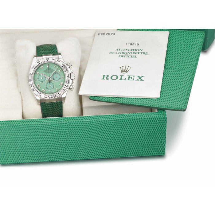 Rolex. A fine, rare and attractive 18K gold automatic chronograph wristwatch with green chrysophrase dial, Garantie and box SIGNED ROLEX, OYSTER PERPETUAL, COSMOGRAPH, DAYTONA, DAYTONA BEACH MODEL REF. 116519, CASE NO. P490973, CIRCA 2000