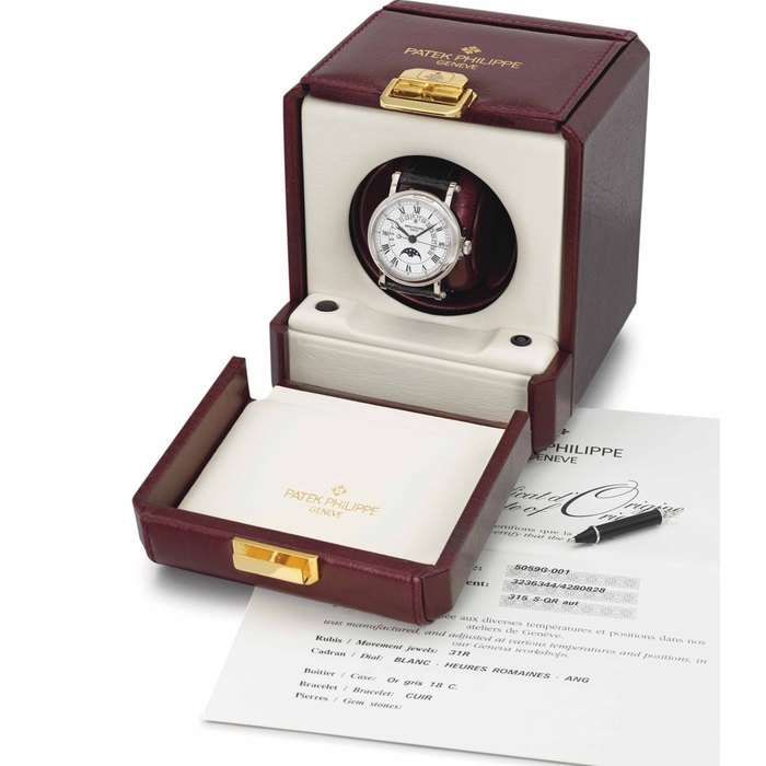 Patek Philippe. A fine and rare 18K white gold automatic perpetual calendar wristwatch with retrograde date, sweep centre seconds, moon phases, original certificate and box SIGNED PATEK PHILIPPE, GENEVE, REF. 5059, MOVEMENT NO. 3'236'344, CASE NO. 4'280'828, MANUFACTURED IN 2005