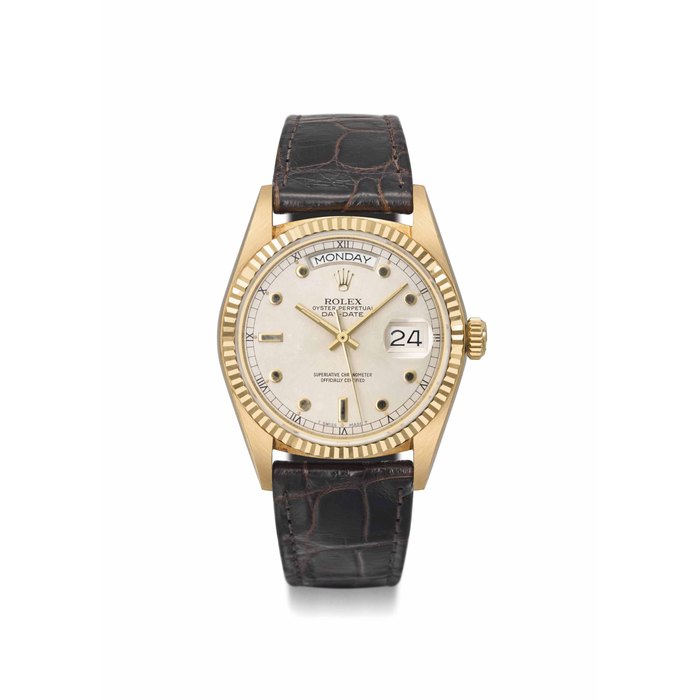Rolex. A fine and very rare 18K gold automatic wristwatch with day, date and sweep centre seconds SIGNED ROLEX, OYSTER PERPETUAL, DAY-DATE, REF. 18038, CASE NO. 9'159'190, CIRCA 1985