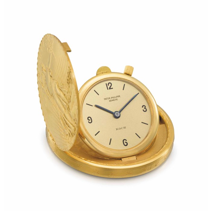 Patek Philippe. A fine and rare 18K gold United States of America Twenty Dollars Coin watch with champagne dial SIGNED PATEK PHILIPPE, GENÈVE, RETAILED BY KOCH, REF. 802, MOVEMENT NO. 861'445, CASE NO. 517'220, MANUFACTURED IN 1962
