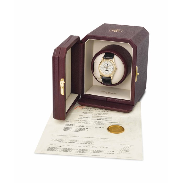 Patek Philippe. A fine 18K gold automatic perpetual calendar wristwatch with sweep centre seconds, retrograde date, leap year indicator, moon phases, original certificate, second case back and box SIGNED PATEK PHILIPPE, GENEVE, AUTOMATIC, REF. 5050, MOVEMENT NO. 1'957'134, CASE NO. 2'947'217, MANUFACTURED IN 1994