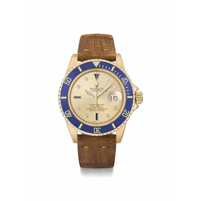 Rolex. A fine, rare and attractive 18K gold sapphire and diamond-set automatic wristwatch with date, sweep centre seconds and champagne dial SIGNED ROLEX, OYSTER PERPETUAL DATE, SUBMARINER, 1000FT=300MT, REF. 16808, CASE NO. 6'559'256, CIRCA 1981