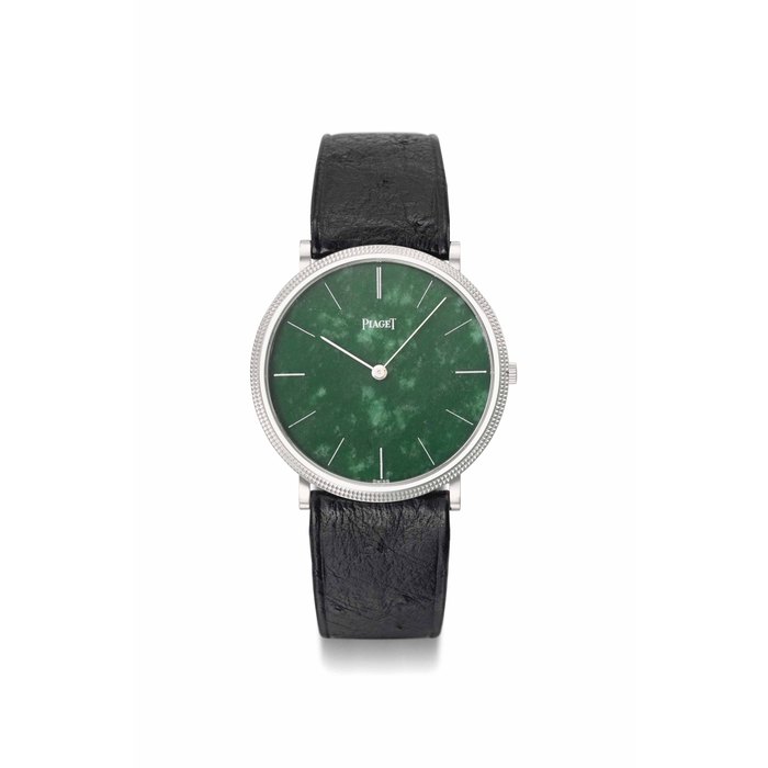 Piaget. An attractive 18K gold wristwatch with hobnail bezel and nephrite dial SIGNED PIAGET, REF. 9031, MOVEMENT NO. 720'859, CASE NO. 179'699, MANUFACTURED IN 1972