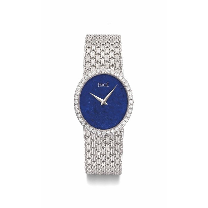 Piaget. A fine, attractive and very elegant 18K white gold diamond-set lady's bracelet watch with lapis lazuli dial and box SIGNED PIAGET, REF. 9826 N 23, MOVEMENT NO. 701'924, CASE NO. 180'012, MANUFACTURED IN 1970