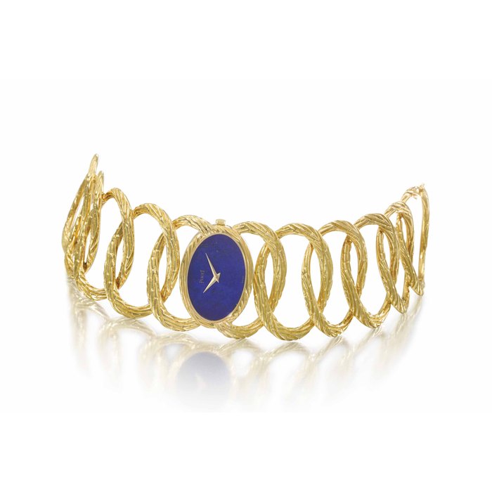 Piaget. A rare and attractive 18K gold bracelet watch with lapis lazuli dial 5IGNED PIAGET, REF. 9850D65, MOVEMENT NO. 690'272, CASE NO. 160'182, MANUFACTURED IN 1968