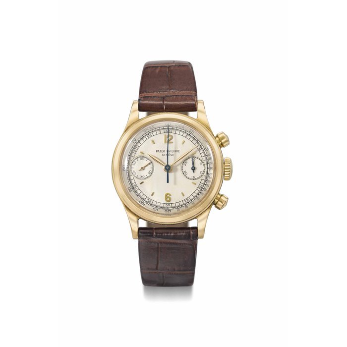 Patek Philippe Patek Philippe. A very rare and attractive 18K gold chronograph wristwatch with two-tone silvered dial SIGNED PATEK PHILIPPE, GENÈVE, REF. 1463, MOVEMENT NO. 868'835, CASE NO. 698'831, MANUFACTURED IN 1956 · 1463