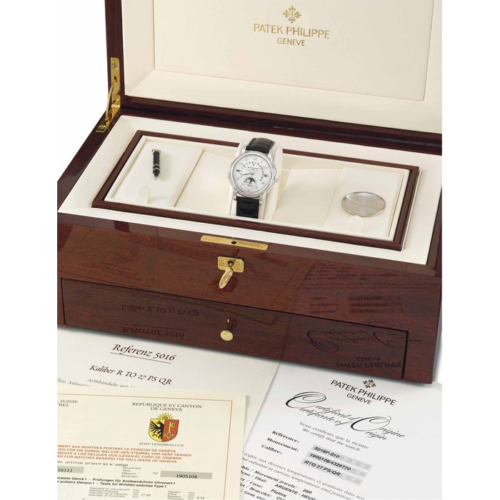 Patek Philippe. An extremely rare and highly important platinum perpetual calendar minute repeating wristwatch with tourbillon, retrograde date, moon phases, Breguet numerals, certificates, second case back and box SIGNED PATEK PHILIPPE, GENÈVE, TOURBILLON, REF. 5016, MOVEMENT NO. 1'905'108, CASE NO. 4'326'770, MANUFACTURED IN 2005