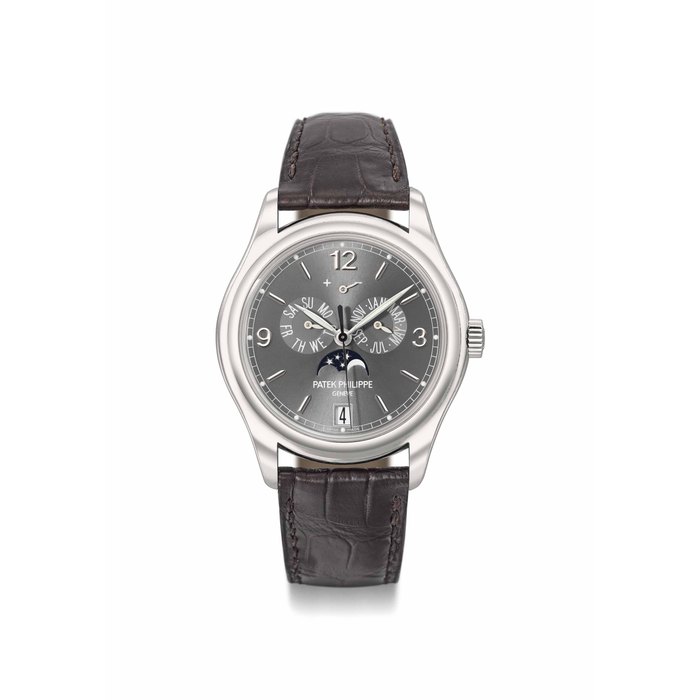 Patek Philippe. A very fine 18K white gold automatic annual calendar wristwatch with sweep centre seconds, moon phases and power reserve Signed Patek Philippe, Genève, ref. 5146, movement no. 3'558'771, case no. 4'366'469, manufactured in 2007