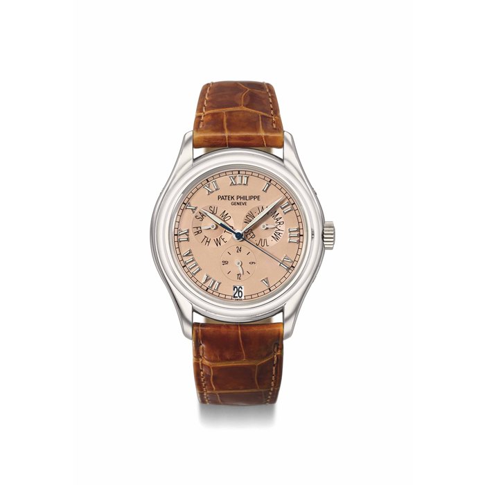 Patek Philippe. A fine 18K white gold automatic annual calendar wristwatch with sweep centre seconds, 24 hours indication, rose dial, Certificate and box Signed Patek Philippe, Geneve, ref. 5035, movement no. 3'059'030, case no. 4'044'158, manufactured in 1999