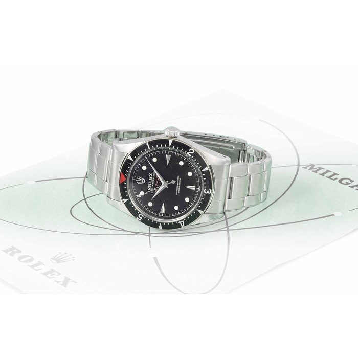 Rolex. An extremely rare and highly attractive stainless steel automatic anti-magnetic wristwatch with black honeycomb dial, sweep centre seconds, bracelet and period brochure Signed Rolex, Oyster Perpetual, Milgauss, ref. 6541, case no. 412'207, circa 1958