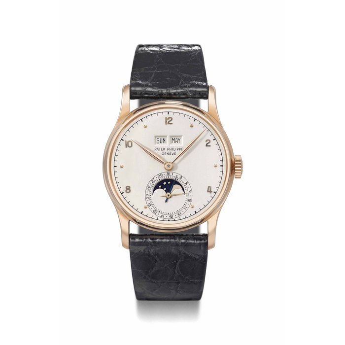 Patek Philippe. A very fine and rare 18K pink gold perpetual calendar wristwatch with phases of the moon Signed Patek Philippe, Genève, ref. 1526, movement no. 966'946, case no. 665'501, manufactured in 1951