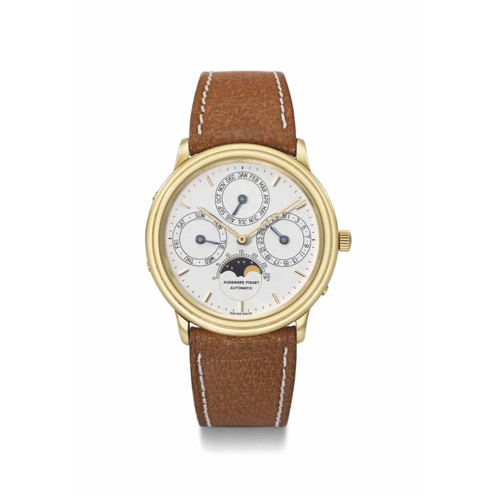 Audemars Piguet. A fine 18K gold automatic perpetual calendar wristwatch with moon phases and Garantie Signed Audemars Piguet, Automatic, Quantieme Perpetuel Automatique, no. 1790, ref. 5548BA, movement no. 273'676, case no. C 7927, manufactured in 1984
