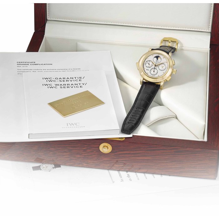 IWC. A very fine, rare and large 18K gold limited edition automatic perpetual calendar minute repeating chronograph wristwatch with moon phases, digital year display, two-tone dial, certificate, box and “Grande Complication” book Signed IWC, Schaffhausen, Grande Complication, No. 09/50, ref. 3770, case no. 3’198’602, manufactured in 2006