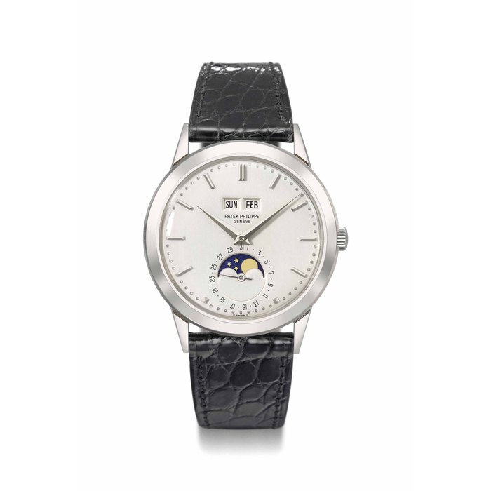 Patek Philippe. An extremely fine and rare 18K white gold perpetual calendar automatic wristwatch with moon phases, possibly unique dial, original certificate and box Signed Patek Philippe, Genève, ref. 3448, movement no. 1’119’285, case no. 330’621, manufactured in 1973
