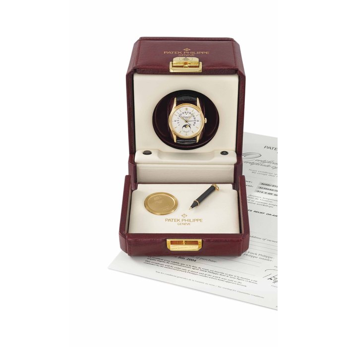 Patek Philippe. A fine 18K gold automatic perpetual calendar wristwatch with sweep centre seconds, retrograde date, leap year indicator, moon phases, certificat, second case back and box Signed Patek Philippe, Geneve, automatic, ref. 5050, movement no. 3’235’682, case no. 2'998'652, manufactured in 2002