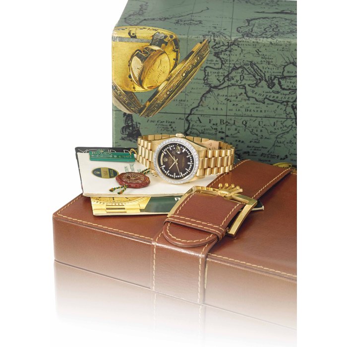 Rolex. A very rare and attractive 18K gold and diamond-set automatic wristwatch with sweep centre seconds, day, date, bracelet, brown degrade dial, Garantie and box Signed Rolex, Oyster Perpetual, Day-Date, ref. 18048, case no. 6'018'917, circa 1979