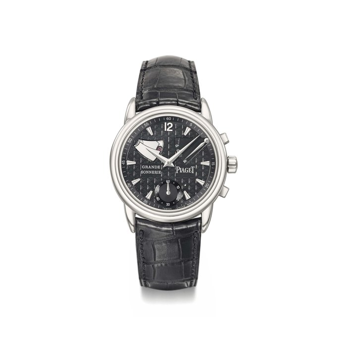 Piaget. An extremely fine and possibly unique 18K white gold two train minute repeating and grande and petite sonnerie striking wristwatch with power reserve, visible hammers, black dial and wooden box Signed Piaget, Grande Sonnerie, 1997, Gouverneur model, case no. 660’329, manufactured in 1997