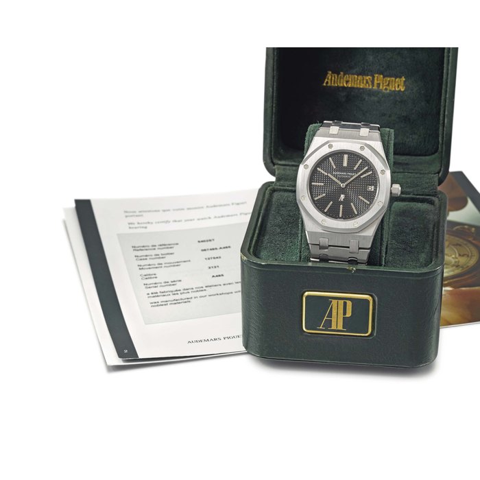 Audemars Piguet. A fine and rare stainless steel automatic wristwatch with date and bracelet, box and certificate Signed Audemars Piguet, Automatic, Royal Oak A-Series Model, ref. 5402ST, No. A 485, movement no. 127542, case no. 067485, circa 1972